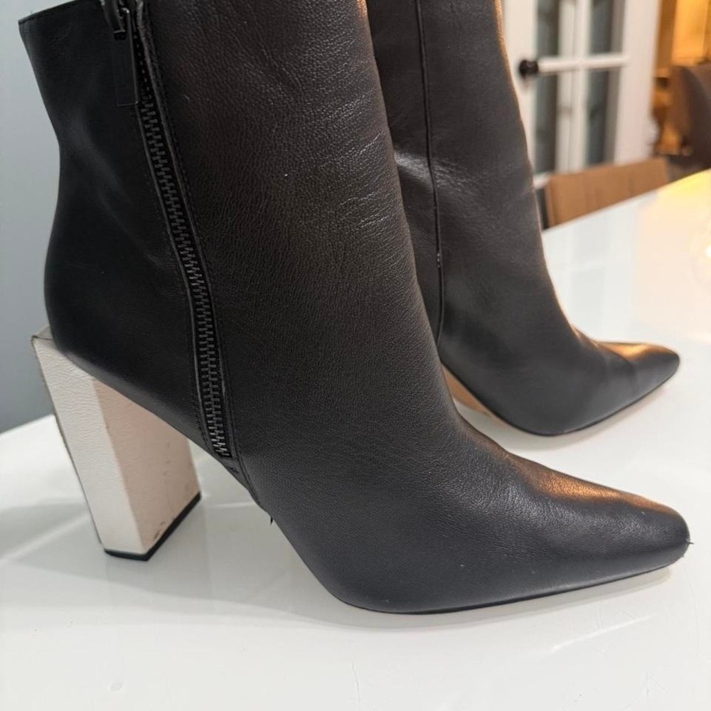 Jessica Simpson black leather ankle boots with chunky modern white heel